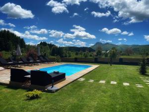 Bazén v ubytovaní Zoe Luxury House alebo v jeho blízkosti