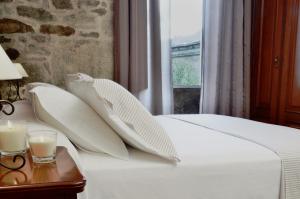 A bed or beds in a room at Sete Artes by Como en Casa