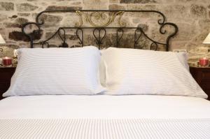 A bed or beds in a room at Sete Artes by Como en Casa