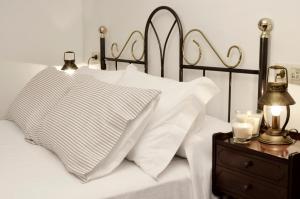 A bed or beds in a room at Sete Artes by Como en Casa