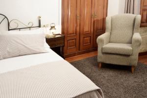 A bed or beds in a room at Sete Artes by Como en Casa