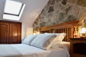 A bed or beds in a room at Sete Artes by Como en Casa