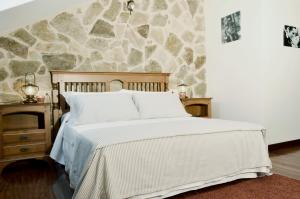 A bed or beds in a room at Sete Artes by Como en Casa