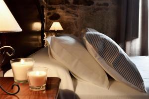 A bed or beds in a room at Sete Artes by Como en Casa