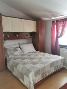Кровать или кровати в номере Apartmani Beba