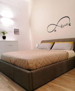 Postel nebo postele na pokoji v ubytování B&B Piano Romano -con parcheggio privato gratuito-