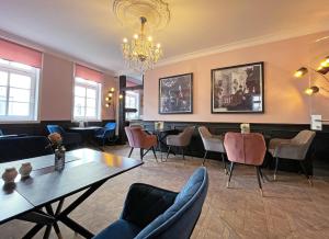 Ein Sitzbereich in der Unterkunft Boutique-Hotel Stadtvilla Hodes