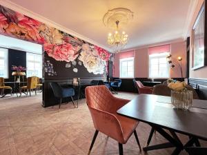 Ein Sitzbereich in der Unterkunft Boutique-Hotel Stadtvilla Hodes