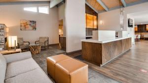 a living room with a couch and a table at Best Western Arcata Inn in Arcata