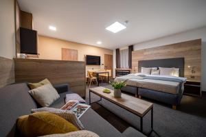 Postel nebo postele na pokoji v ubytování Hotel Zelený potok