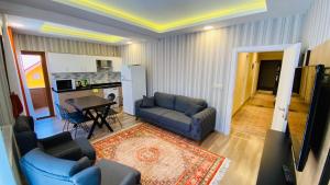 Кухня или мини-кухня в Kaya Residence
