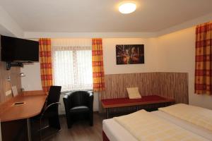TV a/nebo společenská místnost v ubytování Hotel Krone Stühlingen - Das Tor zum Südschwarzwald