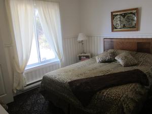 Ένα ή περισσότερα κρεβάτια σε δωμάτιο στο Salmon River Country Inn