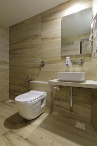 Bagno di Hotel Elysian Residency