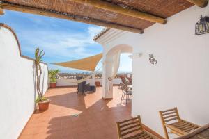 Et opholdsområde på Villa privada con increíbles vistas al mar