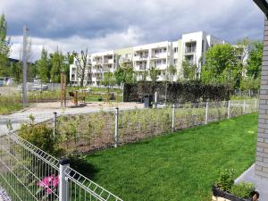 Vonkajšia záhrada v ubytovaní Apartament Szmaragdowy