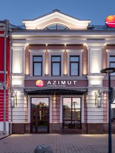 a building with a sign on the front of it at AZIMUT Hotel Tula in Tula