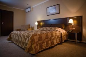 
Кровать или кровати в номере Отель Атриум
