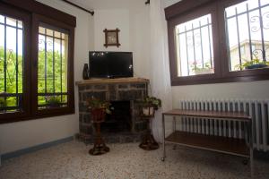 TV a/nebo společenská místnost v ubytování Villa Teresa