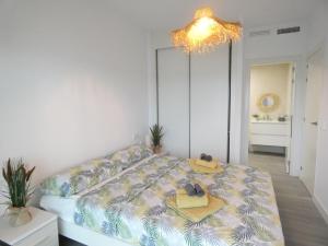 Postel nebo postele na pokoji v ubytování Casa El Dilana - Camporrosso Village - Finestrat