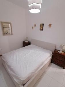 Postel nebo postele na pokoji v ubytování Super terrazzo panoramico