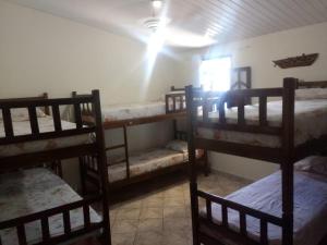 Postel nebo postele na pokoji v ubytování Pousada e Hostel Chapada Suites