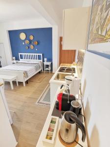 Příslušenství pro přípravu čaje a kávy v ubytování B&B MiraValle Agrigento + 37 fotografií