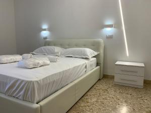Posteľ alebo postele v izbe v ubytovaní Catania Apartment Borgo Suite Autonomous