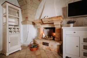 Een keuken of kitchenette bij Tre Archi Suite & Relais
