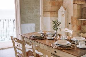 Afbeelding uit fotogalerij van Tre Archi Suite & Relais in Polignano a Mare