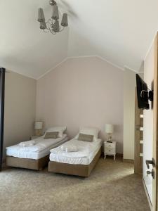 Postel nebo postele na pokoji v ubytování Villa Boja