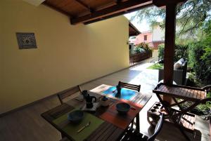 A garden outside Acquamarina - Exclusive Sea House