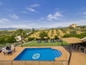 O vedere a piscinei de la sau din apropiere de Cubo's Villa Los Javieles