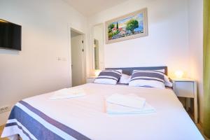 Posteľ alebo postele v izbe v ubytovaní Luxury Seaside Apartment by Litto