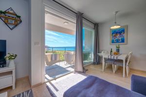 Posteľ alebo postele v izbe v ubytovaní Luxury Seaside Apartment by Litto