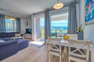 Posedenie v ubytovaní Luxury Seaside Apartment by Litto