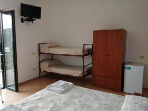Postel nebo postele na pokoji v ubytování Parigino