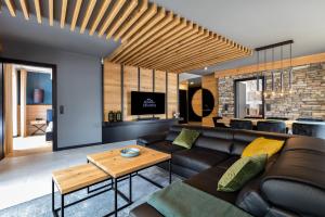 Posezení v ubytování Atemberaubendes und charismatisches Luxus-Apartment in der Residenz Silvretta - Inklusive Silvretta Card Premium