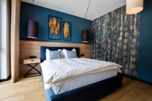 Postel nebo postele na pokoji v ubytování Atemberaubendes und charismatisches Luxus-Apartment in der Residenz Silvretta - Inklusive Silvretta Card Premium