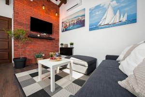 Telewizja i/lub zestaw kina domowego w obiekcie The Attic Rovinj
