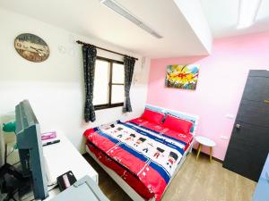 Posteľ alebo postele v izbe v ubytovaní Qilixiang Homestay
