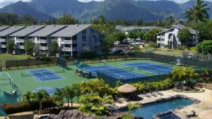 an aerial view of a tennis court at a resort at The Cliffs at Princeville by VRHost in Princeville