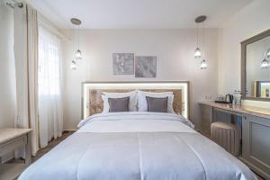 Postel nebo postele na pokoji v ubytování Elementa Boutique Hotel - Adults Only + 37 fotografií