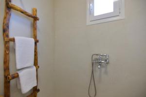 A bathroom at Rhodes Archangelos Traditional village house in with private yard