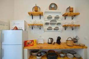 A kitchen or kitchenette at Rhodes Archangelos Traditional village house in with private yard