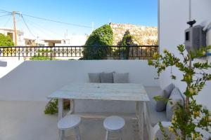 A balcony or terrace at Rhodes Archangelos Traditional village house in with private yard