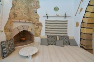 A seating area at Rhodes Archangelos Traditional village house in with private yard