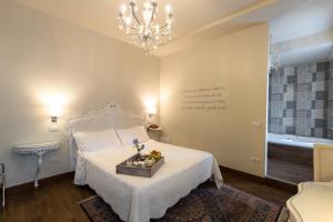 Posteľ alebo postele v izbe v ubytovaní Hotel Serenella