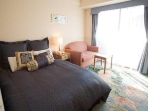 Postel nebo postele na pokoji v ubytování Hotel Villa Kuretake