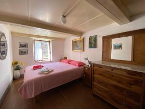 Posteľ alebo postele v izbe v ubytovaní La Casa di Sissy